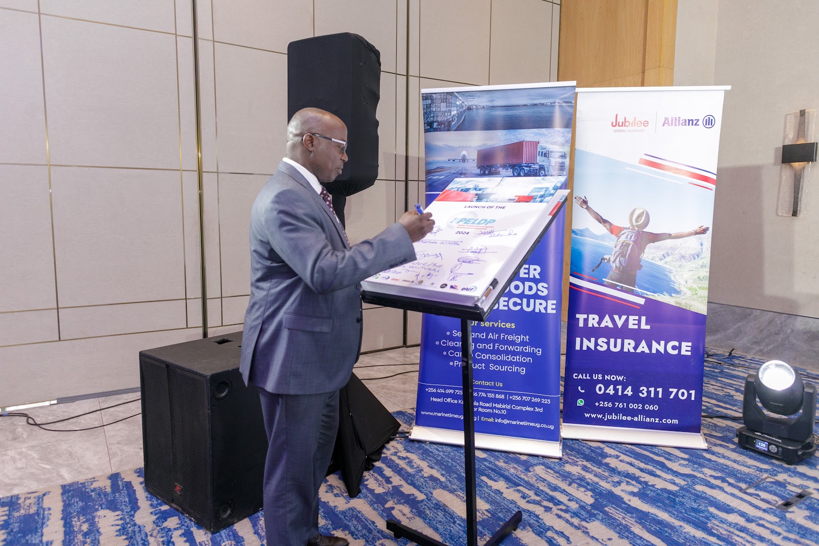 A stakeholder signing the PPELD commitment